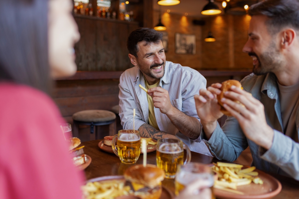 people in a pub eating