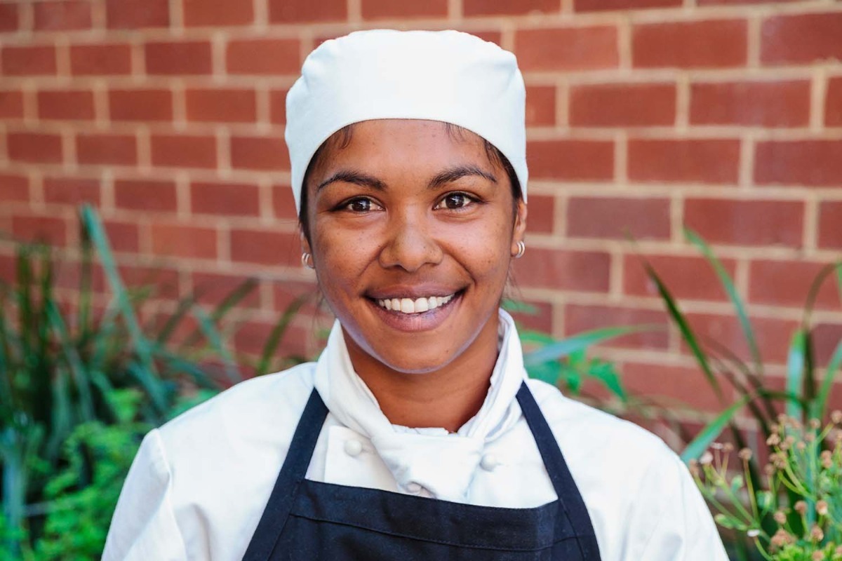 Indigenous chef smiling to camera