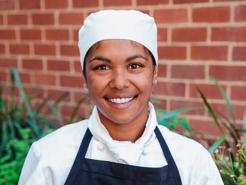 Indigenous chef smiling to camera