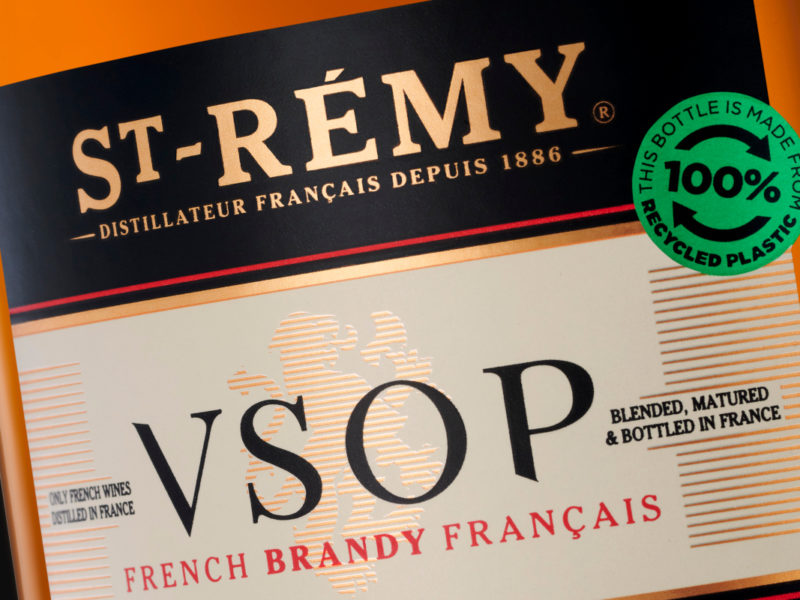 St-Remy bottle label featuring new '100% recycled' sticker
