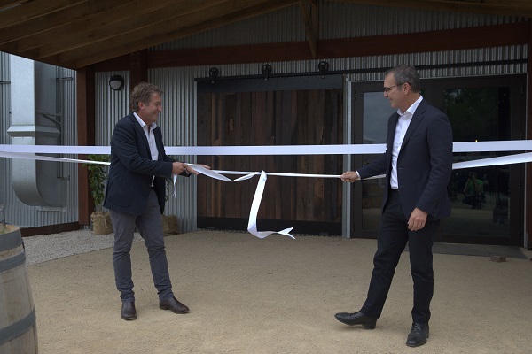 Mark Haysman and Steven Marshall pull the ribbon on the new facility