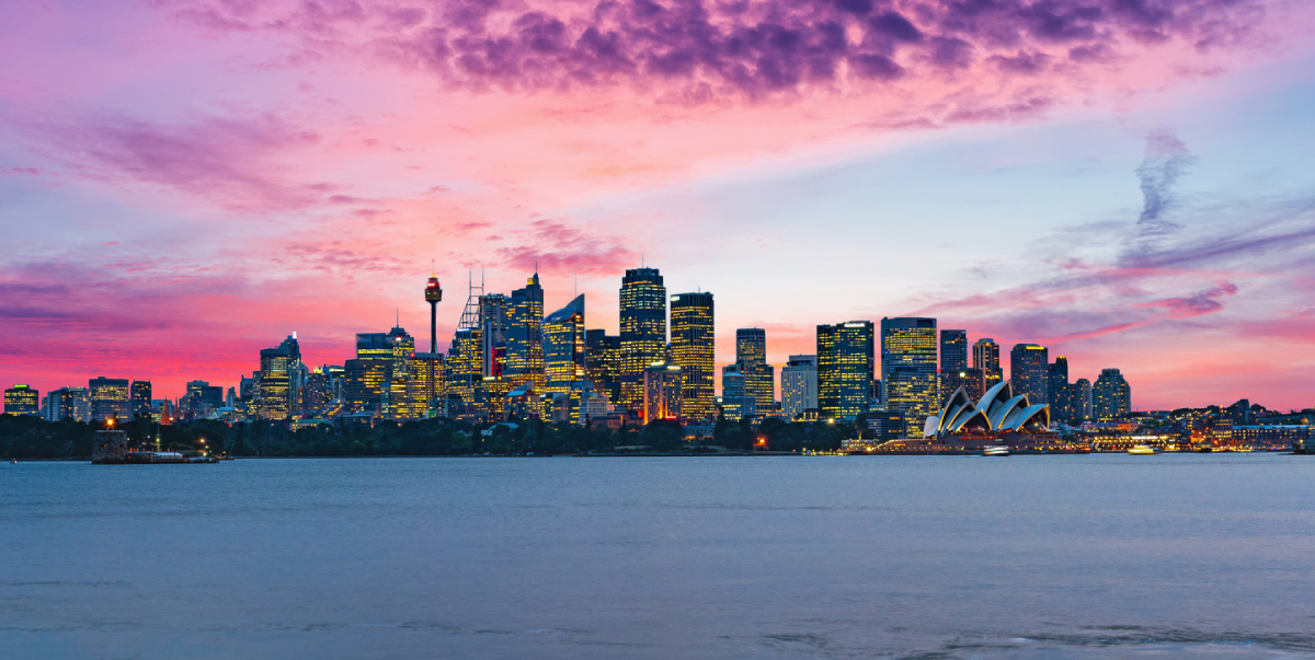 Image of Sydney CBD against a pink sunset