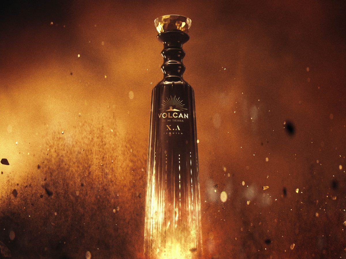 Styled product shot of the Volcan X.A bottle